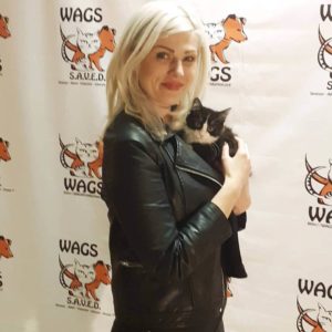 lady adopt a kitten at WAGS