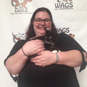 lady adopt a cat at WAGS