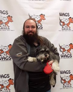 man adopted a dog at WAGS
