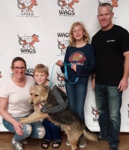 lovely family adopt a dog WAGS