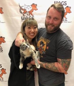 couple adopt a cat at WAGS