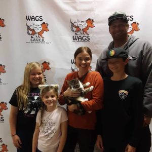 great family adopt a cat at WAGS