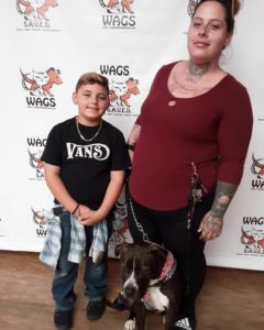 WAGS kid and mother adopt a dog