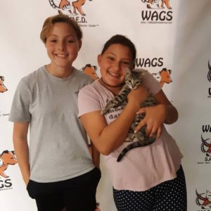 kids enjoy new pet adoption WAGS