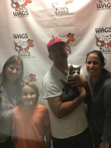 happy family for new adopted cat wags